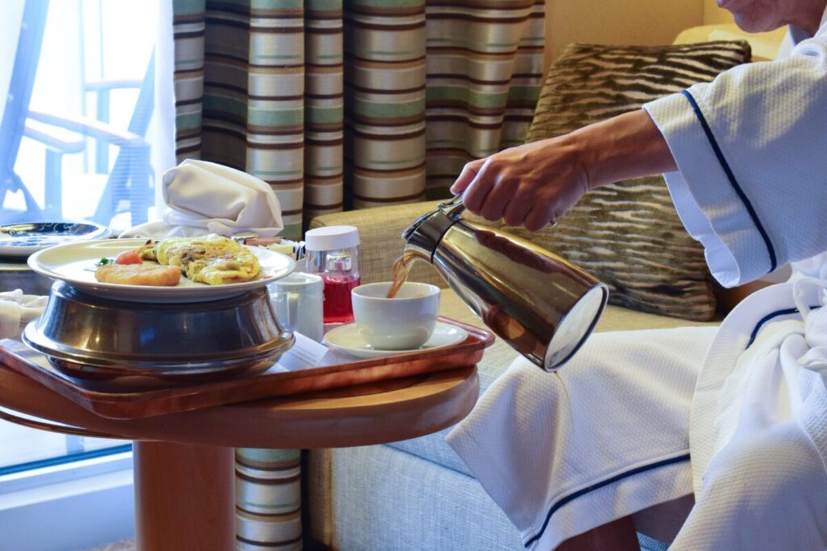 Man having breakfast in his room